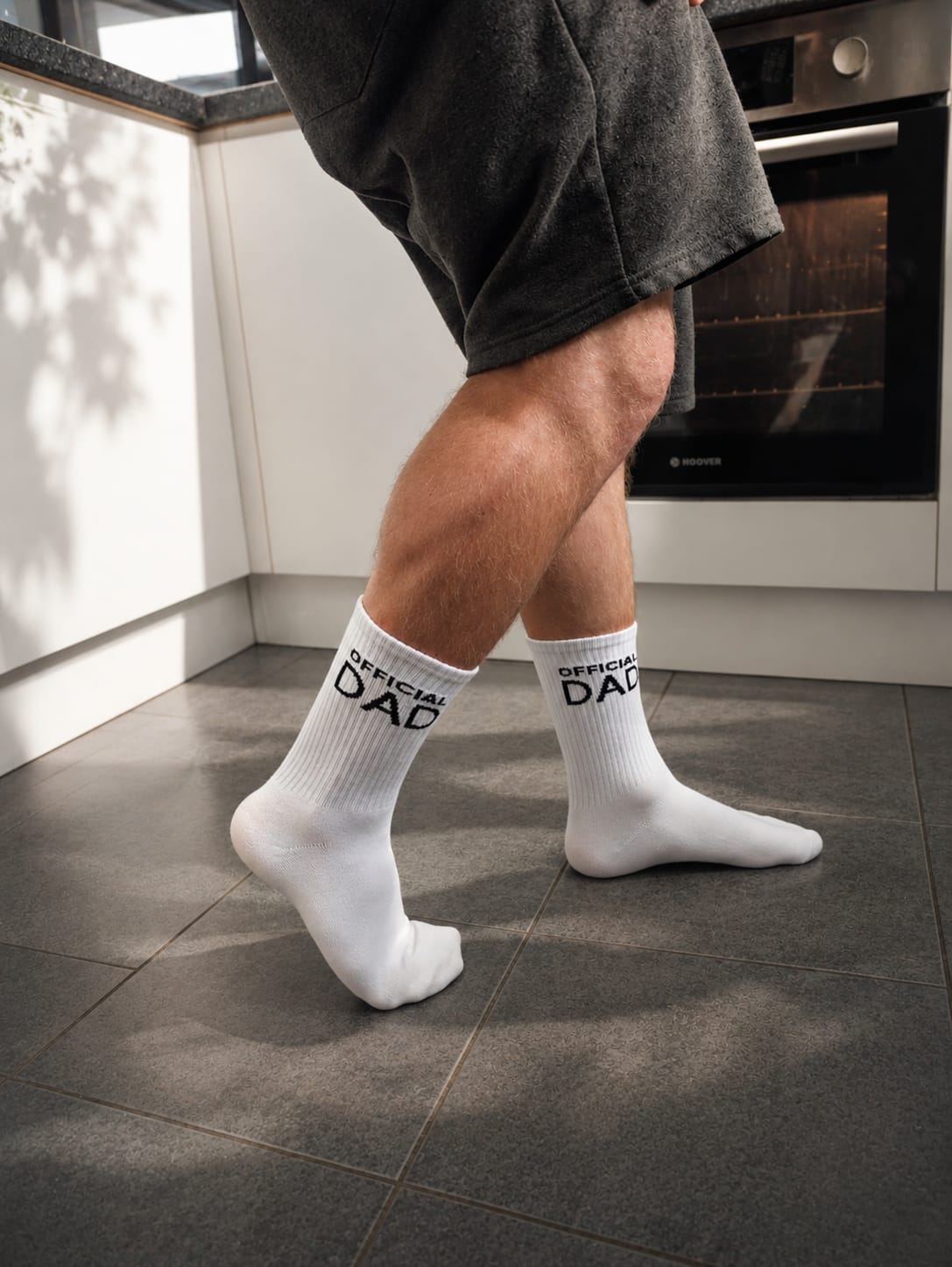 Official Dad socks close up branding detail white crew socks